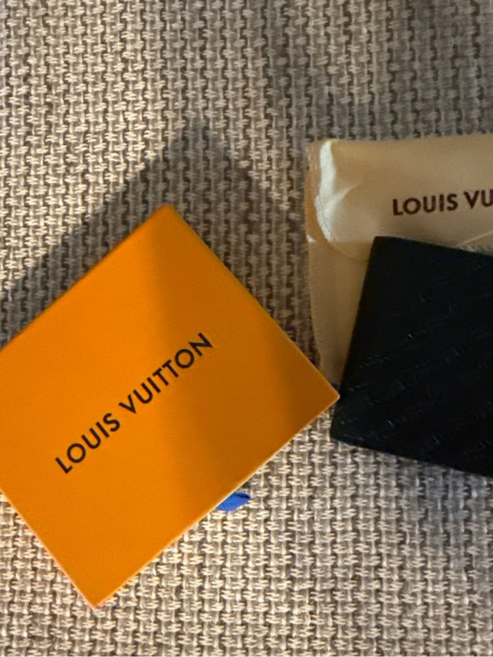 Louis Vuitton Men’s Black Embossed Leather Wallet